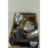 A box of mixed metal wares including cutlery and brass door knobs