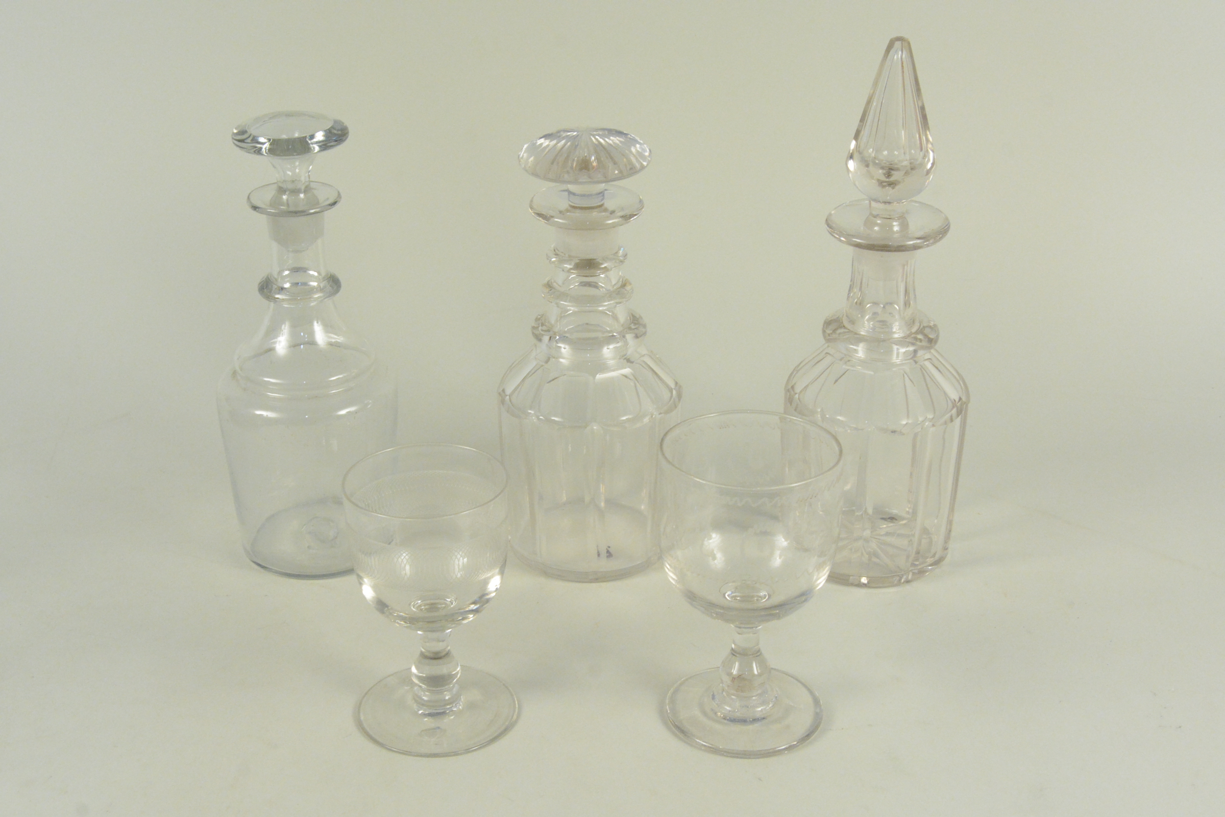 A mixed lot of glass comprising of four various 19th Century decanters, three wine glasses, - Bild 2 aus 3