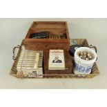 A part wooden box of Willem II cigars plus a ceramic blue jar full of cigars and sixteen packets of