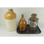 A glazed stoneware spirit container stamped 'R Tanner Wine & Spirit Merchant,