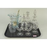 A mixed lot of glass comprising of four various 19th Century decanters, three wine glasses,