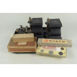 Mixed items including a pair of slate garniture bases, two plastic cased QEII coin collections,