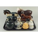 Two ceramic dray horses plus a mare and foal,
