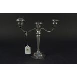 A silver candelabra with hexagonal design and stepped base, hallmarked Birmingham 1971,