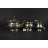 A silver three piece tea set, hallmarked Sheffield 1973,