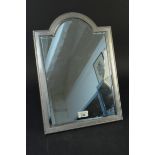 A large Russian silver framed mirror with bead and feathered edge decoration,