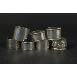 Seven various silver napkin rings,