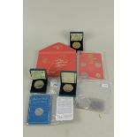 A cased Isle of Man 1980 proof coin set, an 1980 Isle of Man 50 pence in slip case,