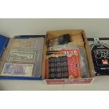 An assortment of mostly 20th Century world banknotes together with assorted UK and world tokens and