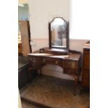 A 1920's walnut Queen Anne style dressing table with triple mirror on cabriole legs (back leg as