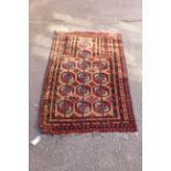 A small handmade gold ground prayer rug,