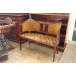 An Edwardian inlaid mahogany two seater settee,