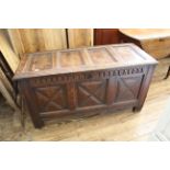 An early 18th Century oak panelled coffer with applied geometric mouldings