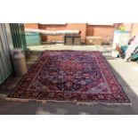 A machine made Persian style wood carpet,