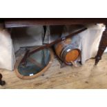 A vintage whisky barrel, oak wall mirror and a mahogany drawing level