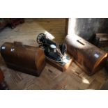 Two cased sewing machines