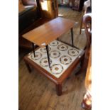 A vintage black leg occasional table together with a mid Century G-Plan tiled topped coffee table