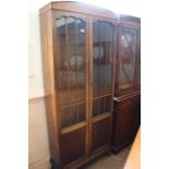 A 1930's two door glazed oak bookcase