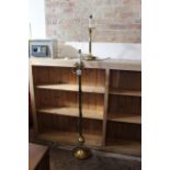 A brass standard lamp plus a brass table lamp