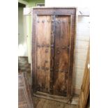 A Middle Eastern carved hardwood door