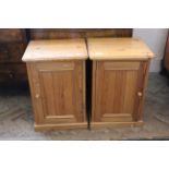 A pair of 20th Century pine bedside cupboards