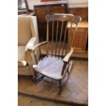 A 19th Century style stick back rocking chair