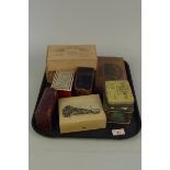 Various wooden cigar boxes, two tobacco tins with advertising, an Italian calf leather card box,
