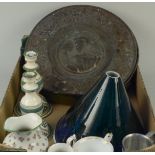 A mixed lot including two enamel and one green glass lamp shades, two embossed brass wall plaques,