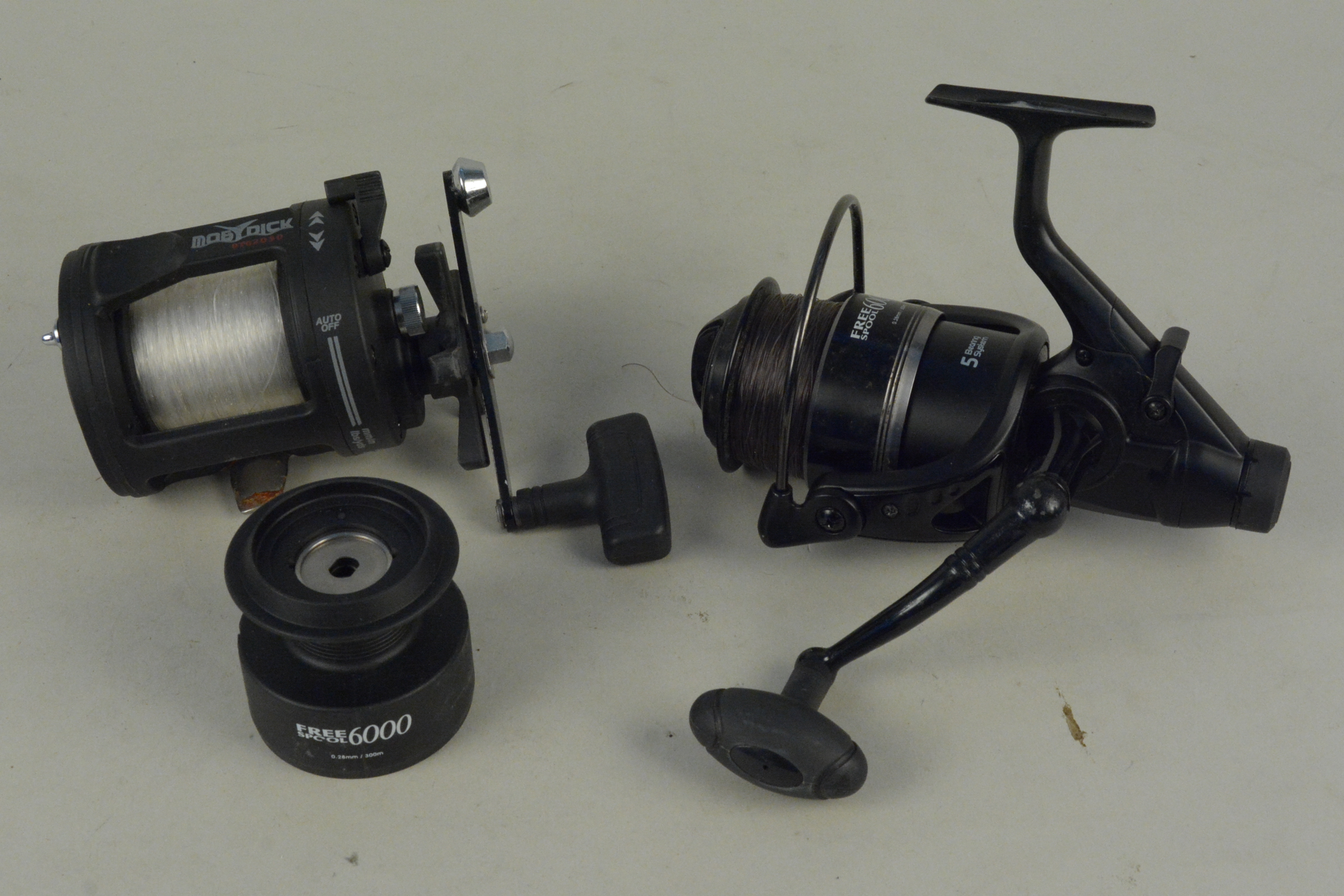 A Maver Mody Dick multiplier reel plus a Korum 6000 fixed spool reel