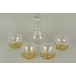 A Stuart crystal decanter with five matching glasses and five dessert dishes etc