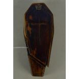 A large early 19th Century hand carved Folk Art snuff box of coffin form with sliding lid with