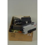 A boxed (untested) Polaroid Autofucus 3500 Land camera together with a Kodak Ektanar 13mm lens and