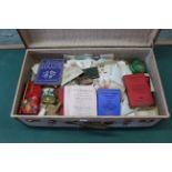 A very large suitcase full of loose stamps,