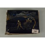 A Japanese lacquered covered postcard album with views of China and Japan plus execution scenes,