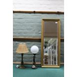 An Art Deco style table lamp with opaque globe,