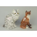 A pottery model of a cat,