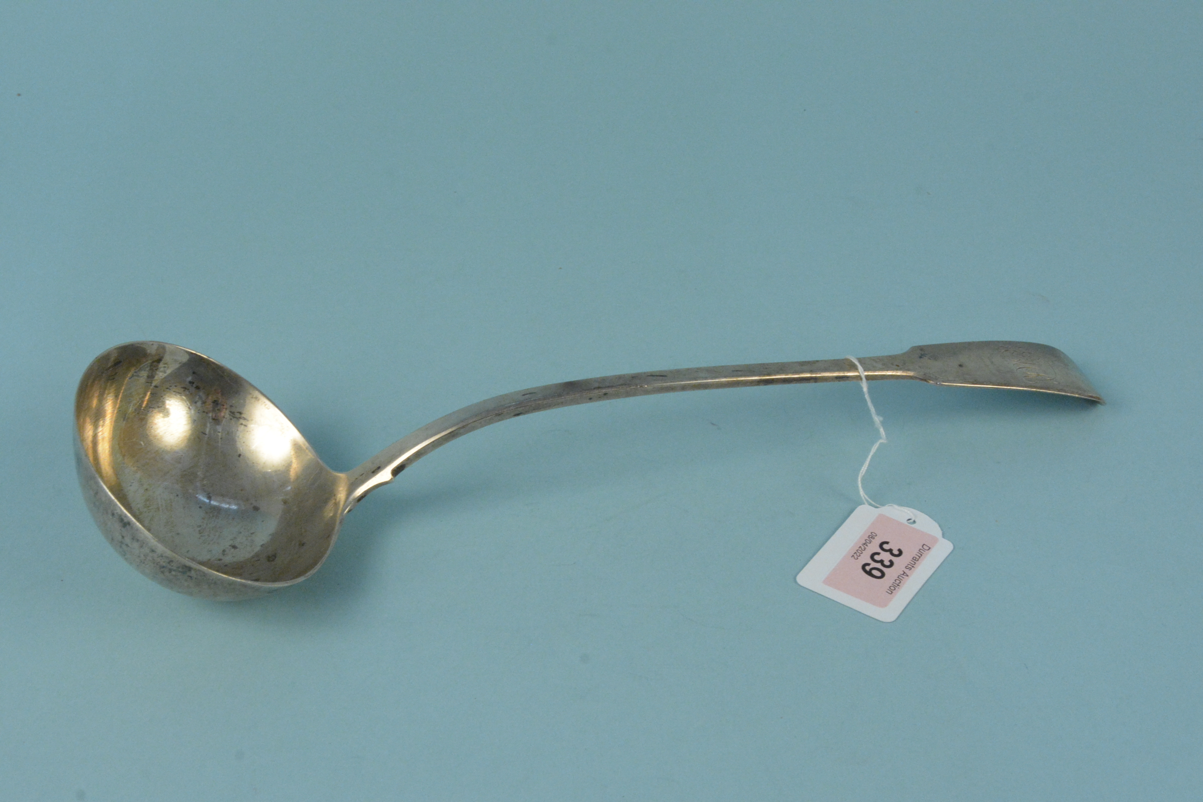 A Georgian silver ladle, hallmarked London 1819, maker William Eley and William Fearn,