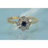 An 18ct gold sapphire and diamond set ring, size M,
