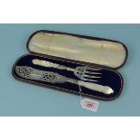 A cased pair of Victorian silver mother of pearl handled fish servers,