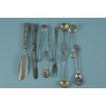 A mixed lot of silver cutlery including George Unite, a Georgian sifter spoon, pierced tongs,