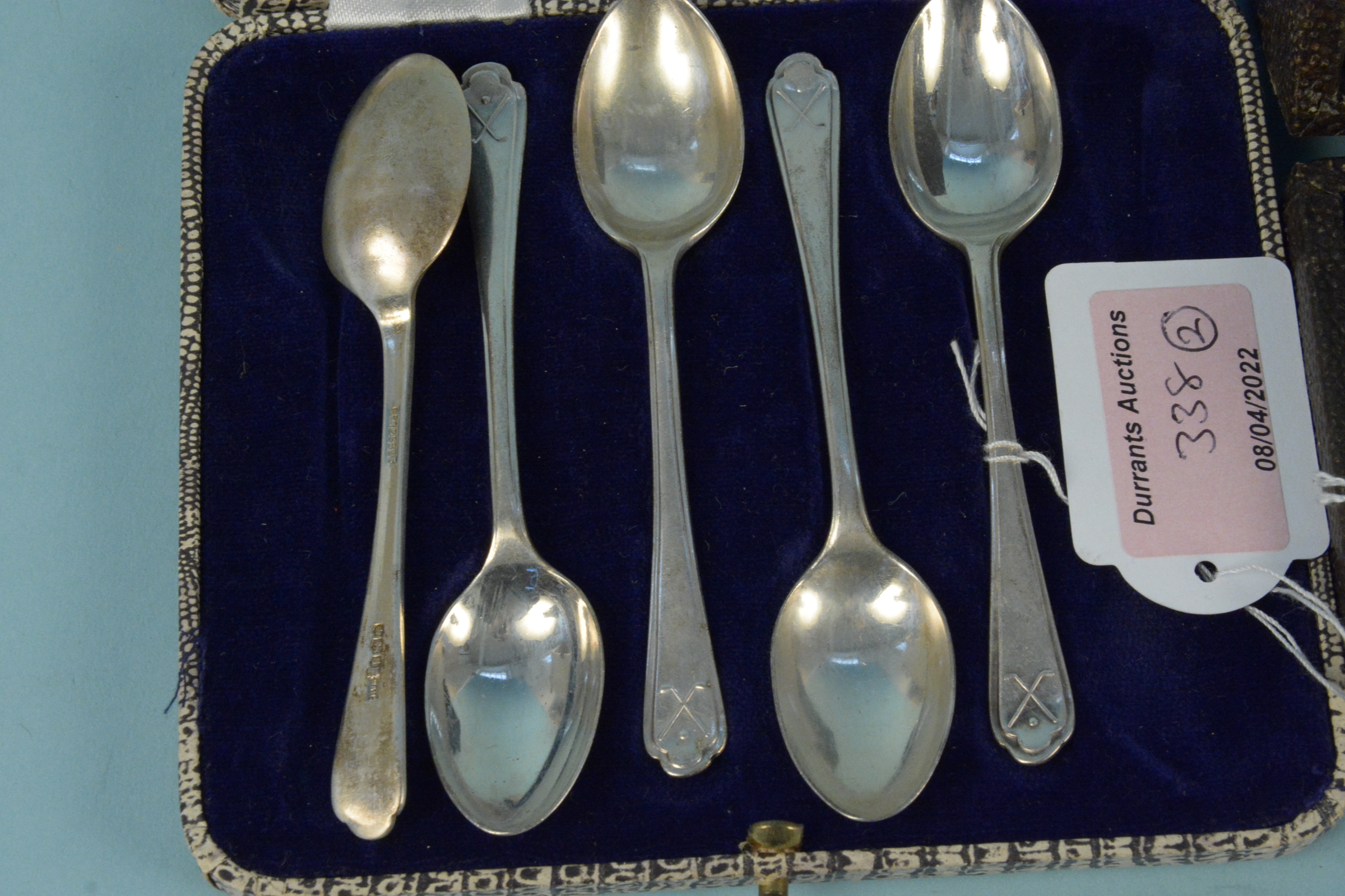 Five (of six) silver teaspoons with golf decoration plus two silver napkin rings, - Image 3 of 3