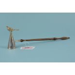 A silver candle snuffer with grouse to top and turned wooden handle,