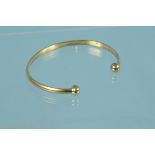 A 9ct gold torque bangle,