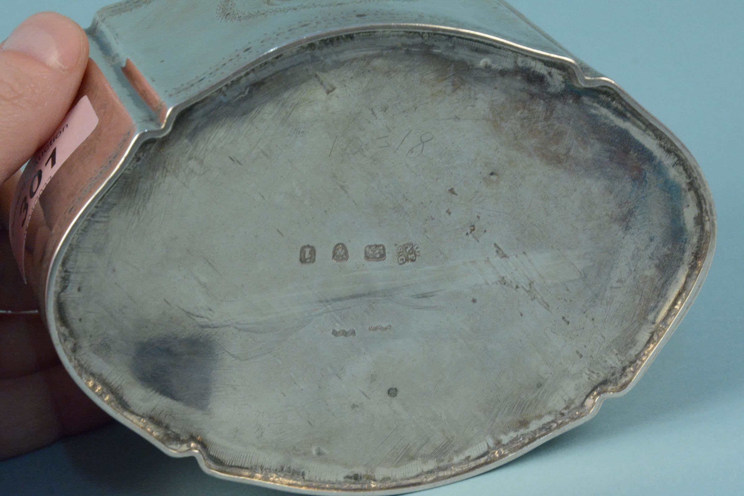 A Georgian silver tea caddy with engraved border and large monogram to centre with applied floral - Image 3 of 3