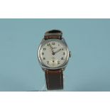 A 1950's nickel cased military style wristwatch by J W Benson