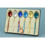 A set of David Anderson silver gilt enamelled coffee spoons in original box and original tag
