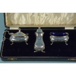 A silver three piece cruet set (cased), hallmarked Birmingham 1940,