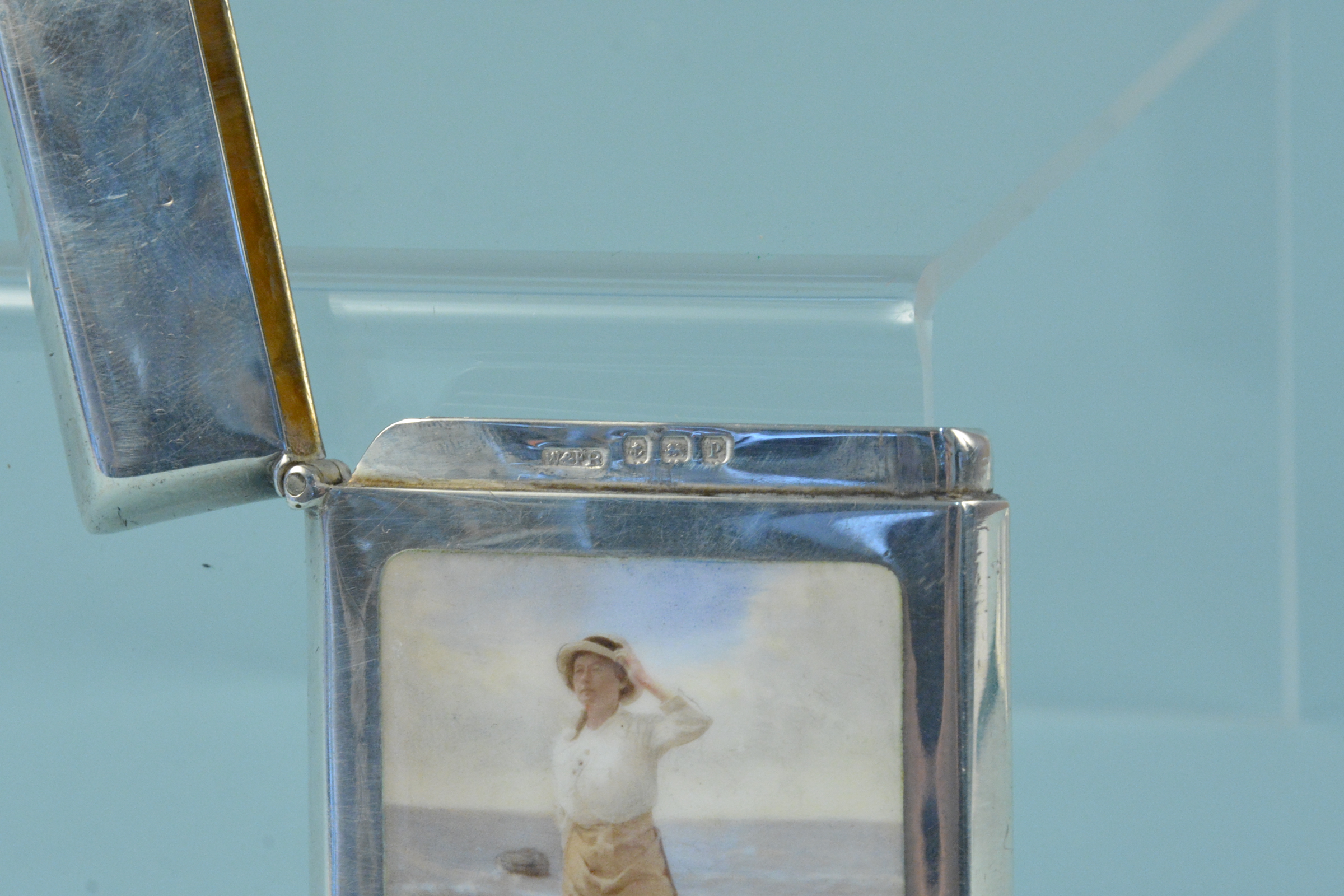 A silver card case with enamelled beach scene to both sides, one side with a lady paddling in water, - Image 3 of 3