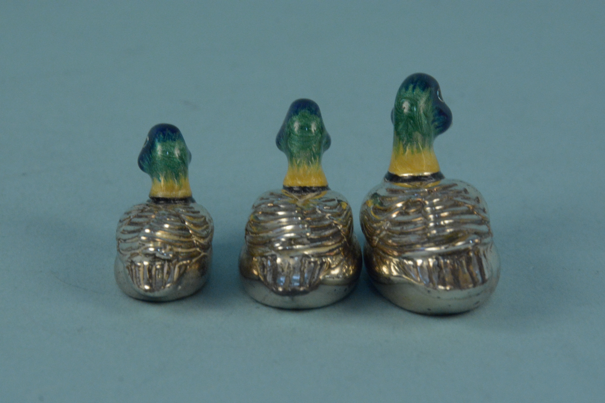 A graduating set of three silver enamelled ducks, - Image 2 of 3