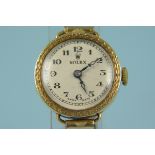 A c1950's lady's 18ct gold cased Rolex watch on rolled gold bracelet
